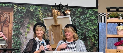 Jane Harris, Women's Ministries director, (left) and Cathy Oliver, Women's Ministries assistant, (right) in their aprons before a cooking event. 