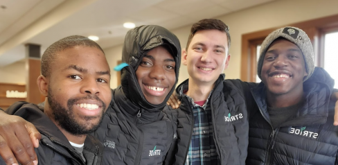 From left to right, Joseph, Danny, Thomas and Adiv pause for a quick selfie during classes at the conference office. 